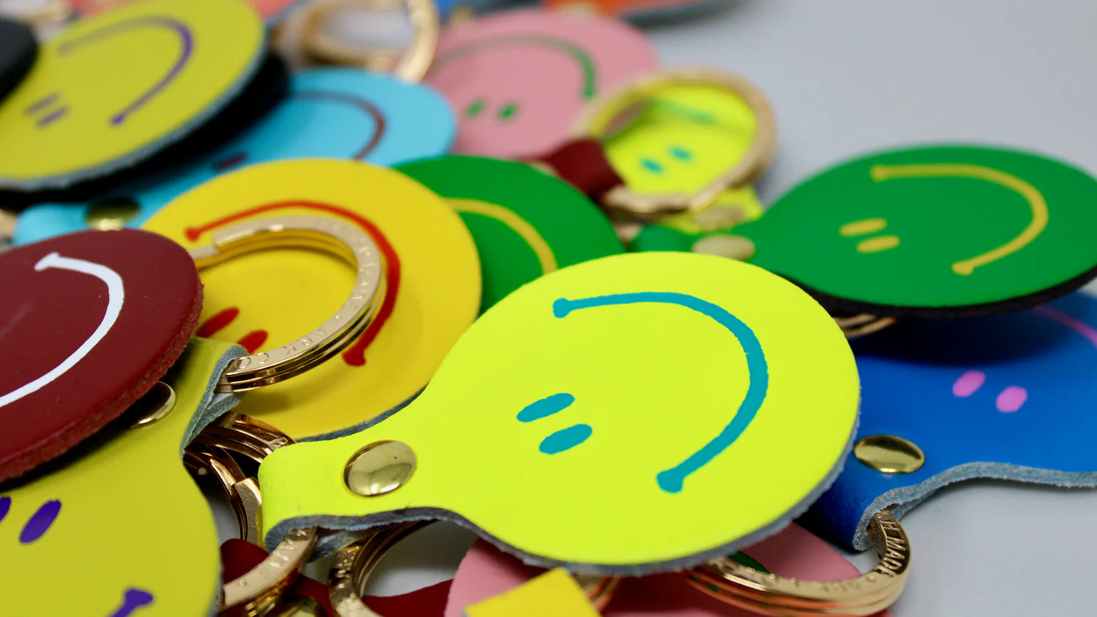 Ark - Smilie Face Keyring - Various Colours